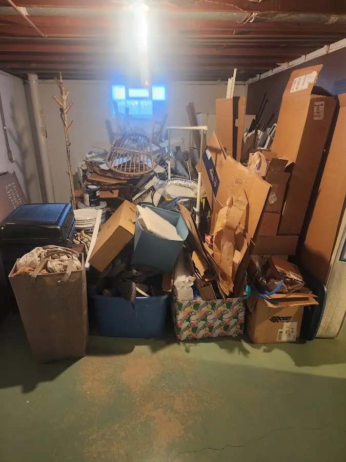 Roll-off dumpster container at job site for 2 Yard Dumpster Rental in Defiance